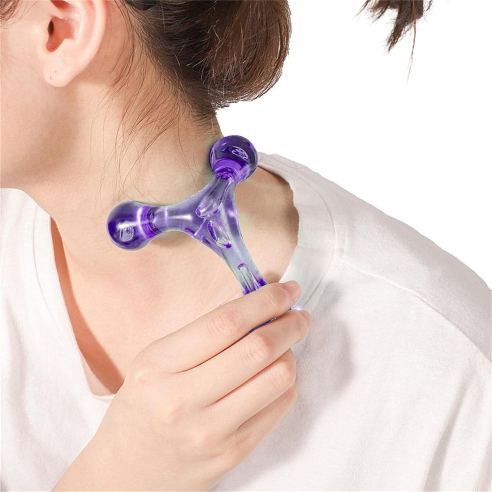 Masazhues dore me tri pika